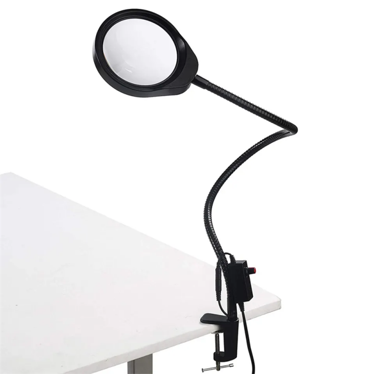 Luce con morsetto d'ingrandimento